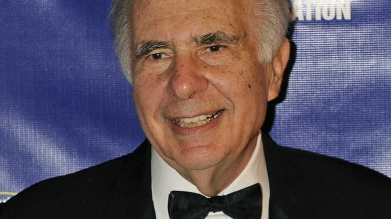 Carl Icahn, above, is involved in a public dispute with...