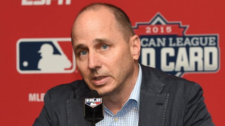 New York Yankees general manager Brian Cashman addresses the media...