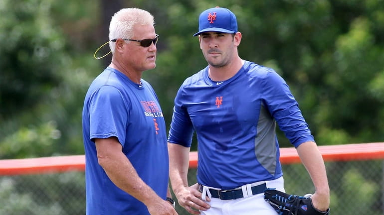 Mets pitcher Matt Harvey, right, talks with rehabilitation coordinator John...