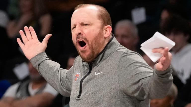 Knicks head coach Tom Thibodeau reacts during the first half...