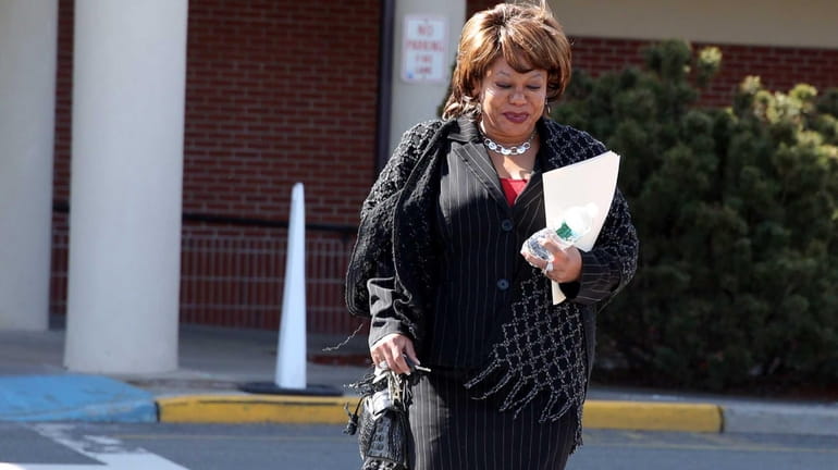 Spring Valley Mayor Noramie Jasmin leaves her office after declaring...