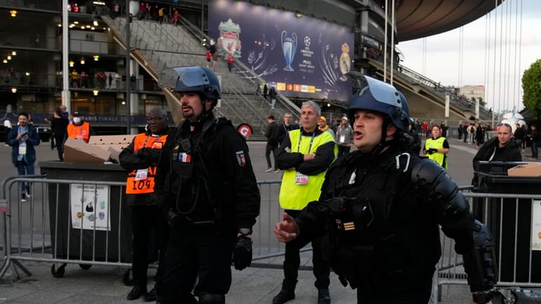 Police officers guard the Stade de France prior the Champions...