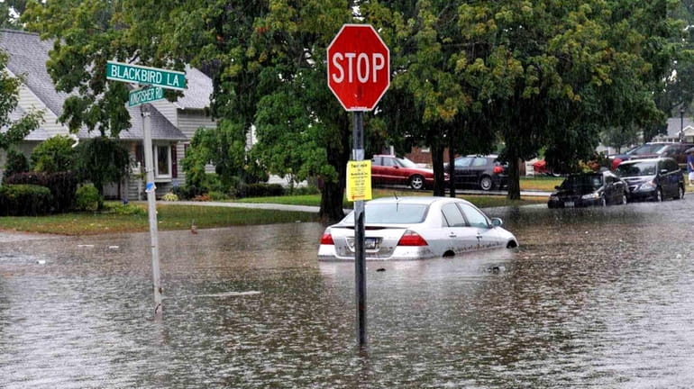Flooding in Levittown left one car soaked. (July 10, 2010)