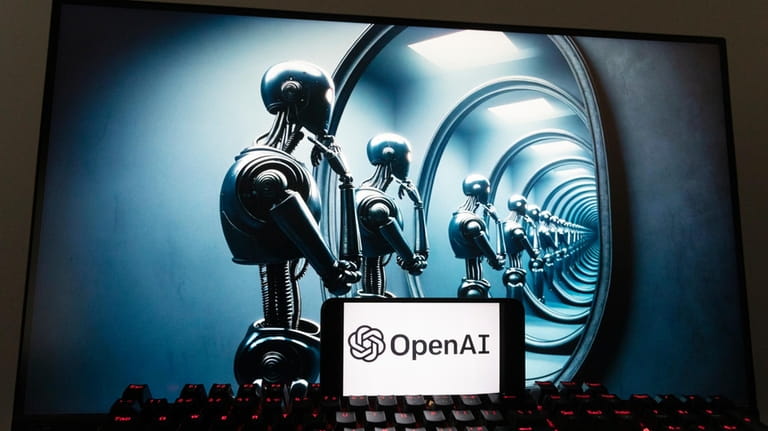 The OpenAI logo is seen displayed on a cell phone...