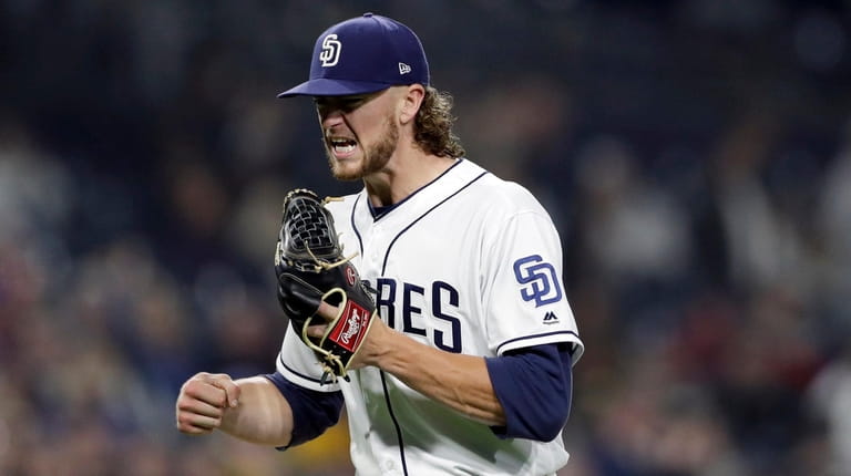 San Diego Padres starting pitcher Chris Paddack reacts as he...