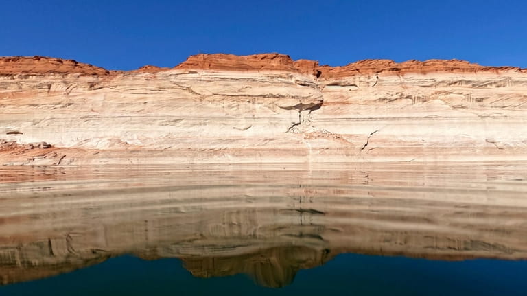 Bathtub rings show how low Lake Powell levels have declines,...