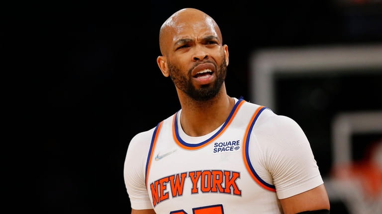 Knicks center Taj Gibson  reacts after being ejected from the...