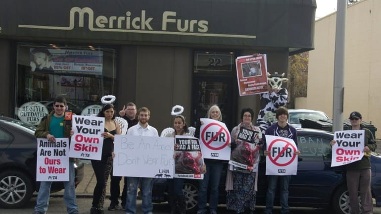 Animal rights activists protest the use of real fur in...