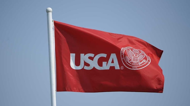 A USGA flag flies during a practice day at the...