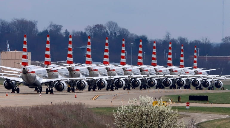 American Airlines planes stored at Pittsburgh International Airport sit idle...