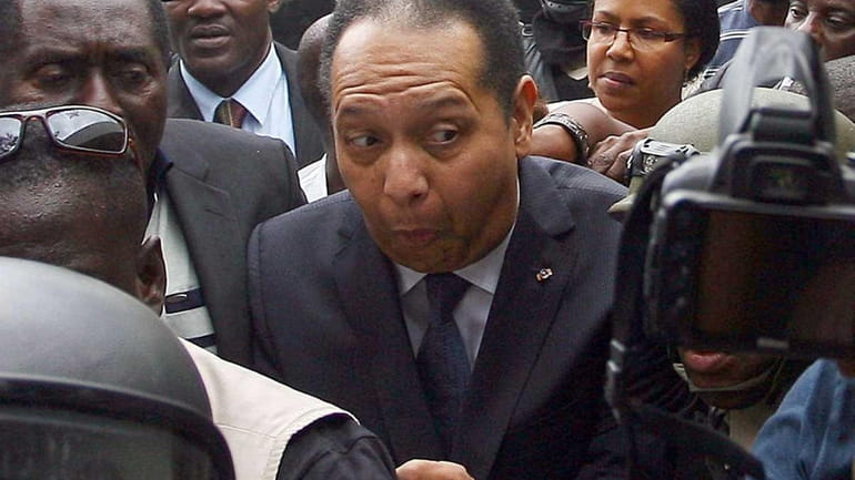 Former Haitian dictator Jean-Claude "Baby Doc" Duvalier arrives at the...