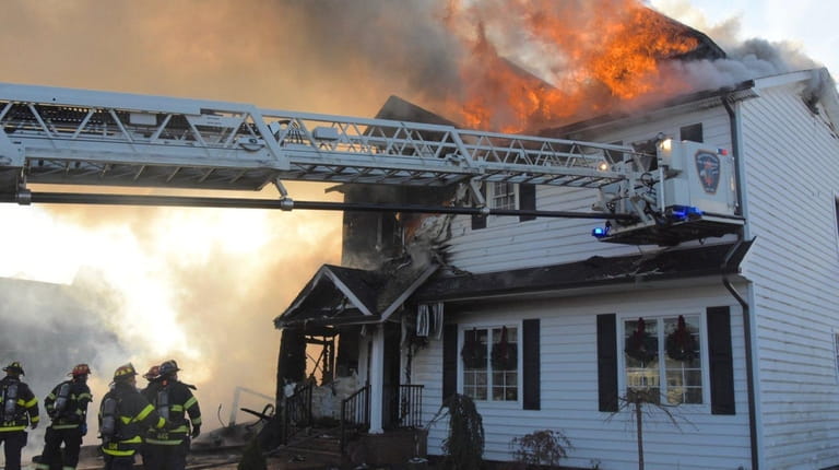 Two homes caught fire in Massapequa on Monday afternoon, Dec....
