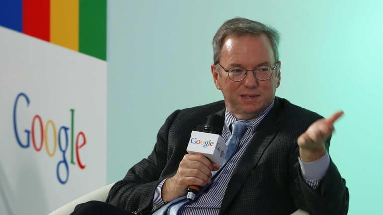 Eric Schmidt, executive chairman of Google, speaks during a session...
