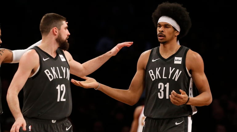 Jarrett Allen of the Nets reacts after a basket against the...
