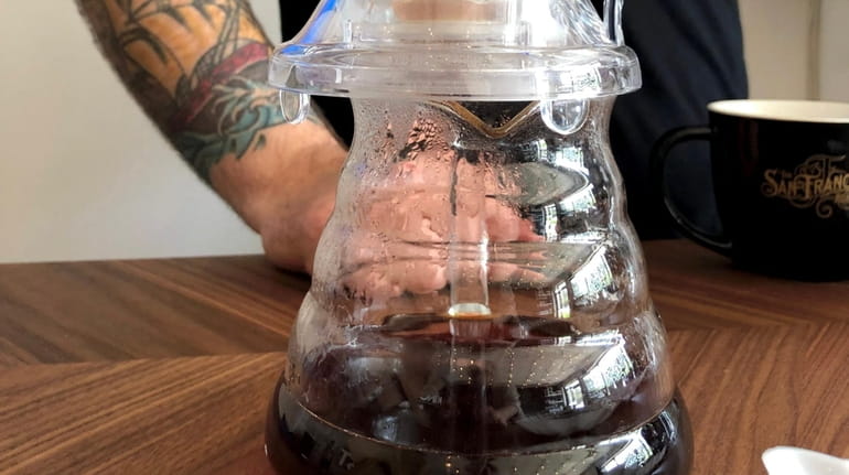 A pour-over in progress at Kings Coast Coffee Co., which...