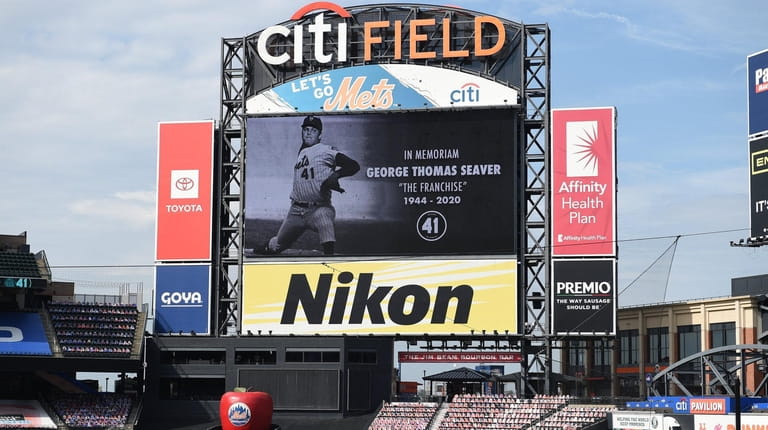 Mets legend Tom Seaver is remembered on the video board...