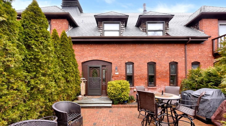 Priced at $499,000, this six-room townhouse on Quality Street was...