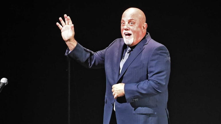 Billy Joel performs before a sellout crowd at Nassau Coliseum...