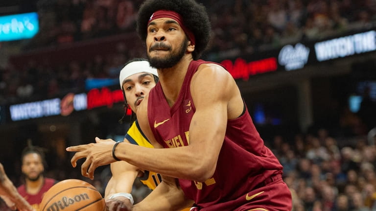 Cleveland Cavaliers' Jarrett Allen, right, is fouled by Indiana Pacers'...