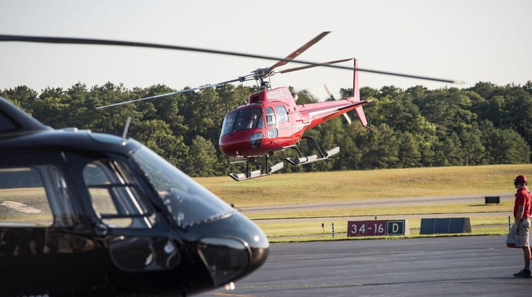 Helicopters, seen at the East Hampton Town Airport in Wainscott,...