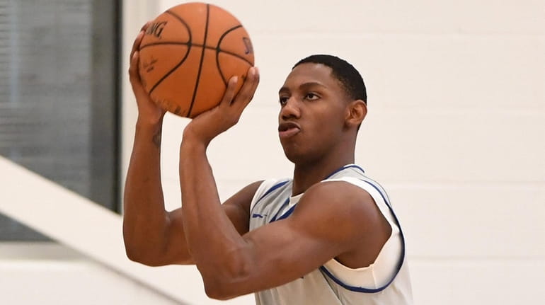 The Knicks' RJ Barrett shoots during training camp practice at...