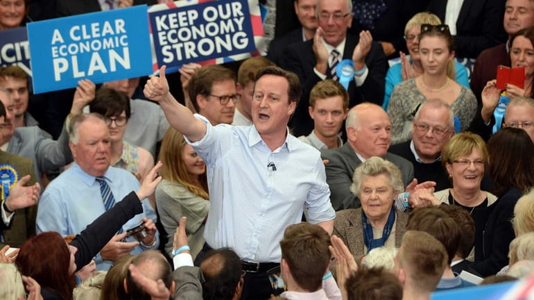British Prime Minister David Cameron during an election campaign stop...