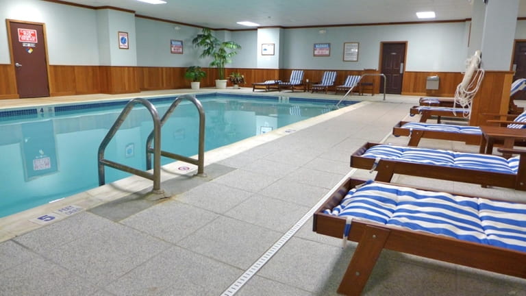 This indoor pool is among the amenities available to guests...