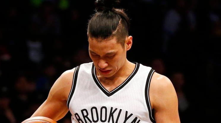 Jeremy Lin #7 of the Brooklyn Nets reacts during the...
