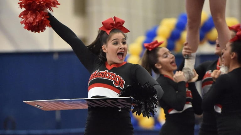 Mount Sinai Mustangs while competing in the 2019 NYSPHSAA Cheerleading...