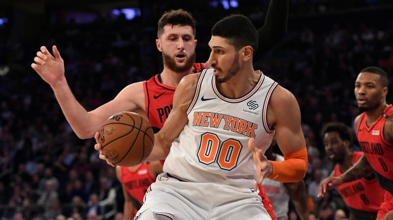 The Knicks' Enes Kanter dribbles the ball during the second quarter...