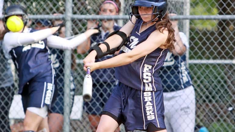 Showing she can also swing the bat, Eastport-South Manor's Catherine...