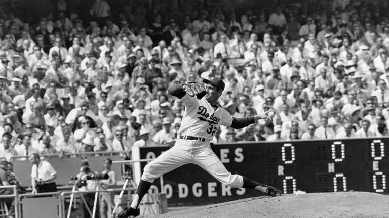 Sandy Koufax of the Los Angeles Dodgers pitching in the 1966...