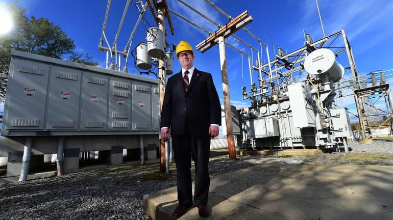 PSEG president David Daly shows the newly elevated LIPA substation...