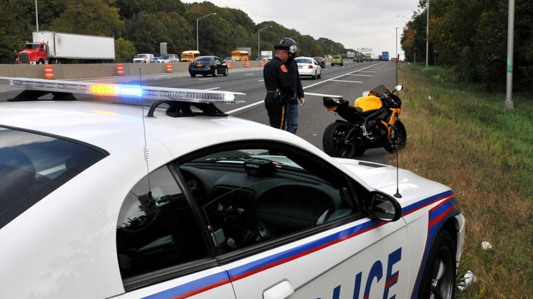 A police car during a traffic stop on the Long...