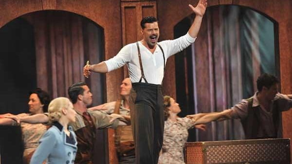 Elena Roger and Ricky Martin perform from "Evita" onstage at...