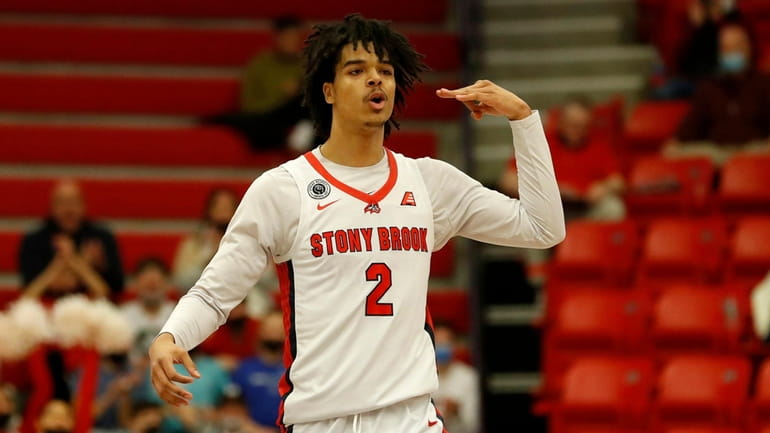 Frankie Policelli #2 of Stony Brook reacts after hitting a...