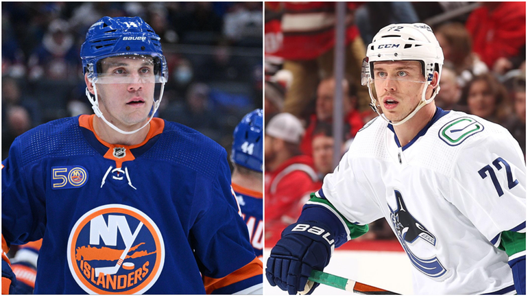 Bo Horvat of the Islanders and Anthony Beauvillier of the...