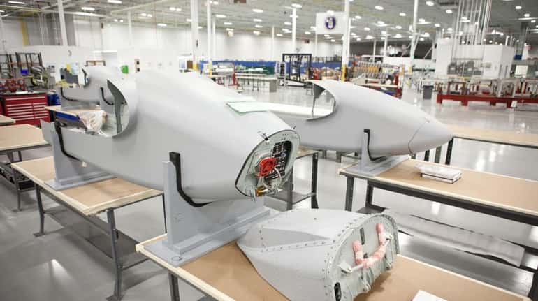 Aircraft parts are manufactured on the factory floor of CPI Aerostructures...