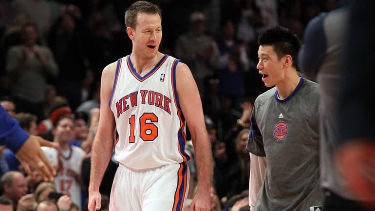 Steve Novak and Jeremy Lin talk during a game against...