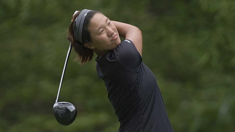 MacArthur's Annie Park teeing off at the 18th hole during...