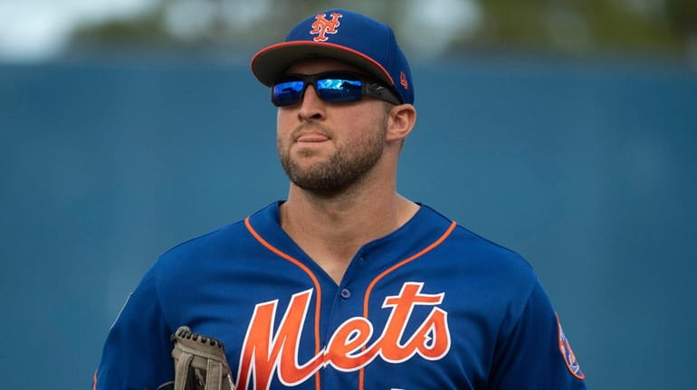 Mets' Tim Tebow during a spring training game against the Braves at...