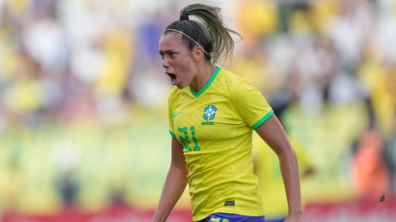 Brazil's Priscila celebrates after scoring her side's fourth goal during...