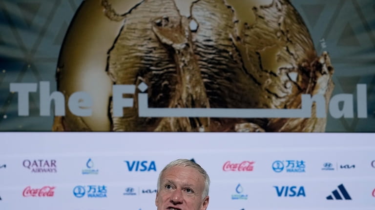France's head coach Didier Deschamps answers questions during a press...