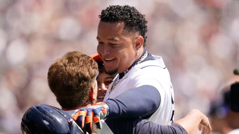 Detroit Tigers designated hitter Miguel Cabrera greets his family after...
