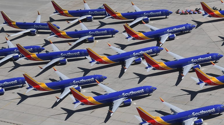 Southwest Airlines Boeing 737 MAX aircraft are parked on the...