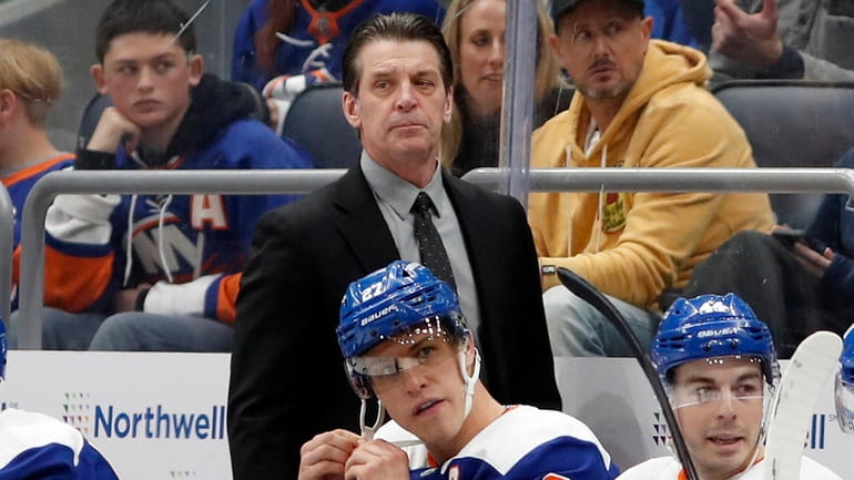 Head coach Lane Lambert of the Islanders looks on during...