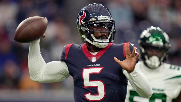 Texans quarterback Tyrod Taylor passes in the first half of an...