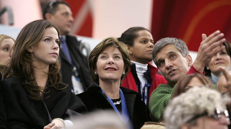 FILE - United States first lady Laura Bush, center, and...