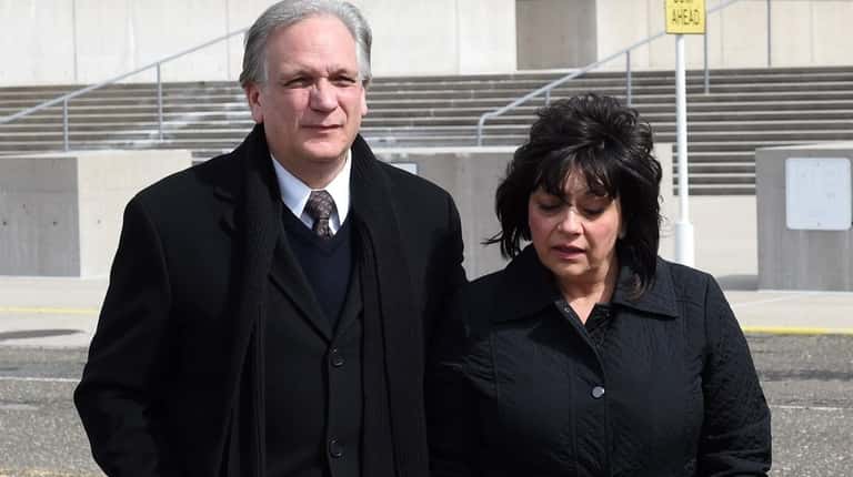 Edward and Linda Mangano outside federal court in Central Islip...
