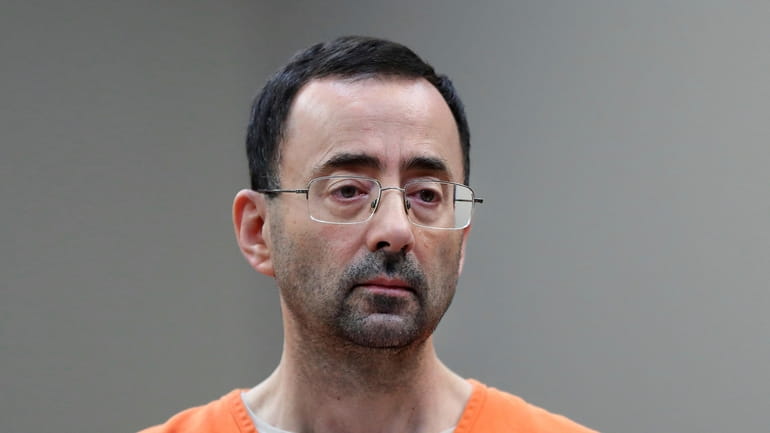 Disgraced former sports doctor Larry Nassar appears in court for...